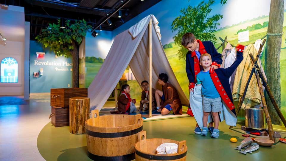 kids exploring inside museum