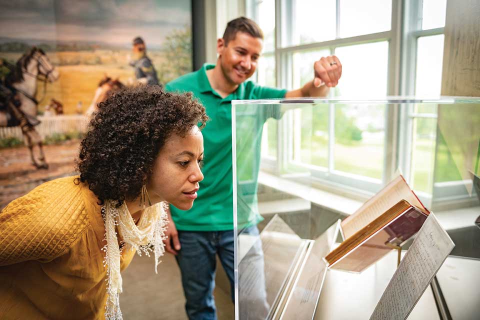 couple exploring archives at museum