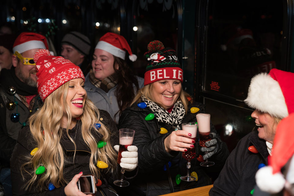 people on holiday trolley enjoying drinks