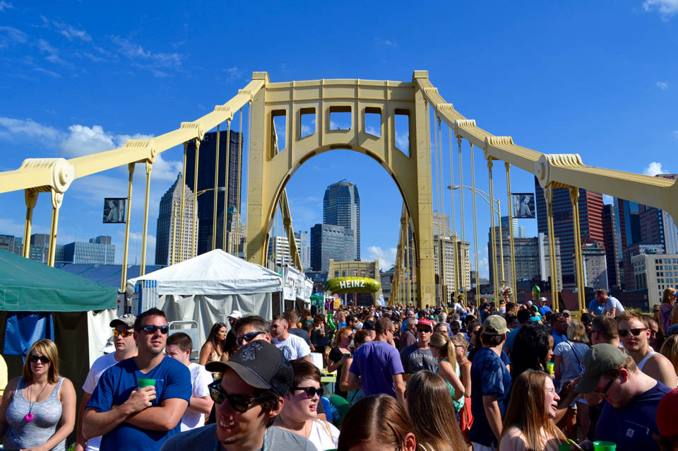 crowd at picklesburgh event on Pittsburgh steel bridge