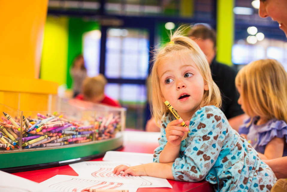 kids playing with crayons