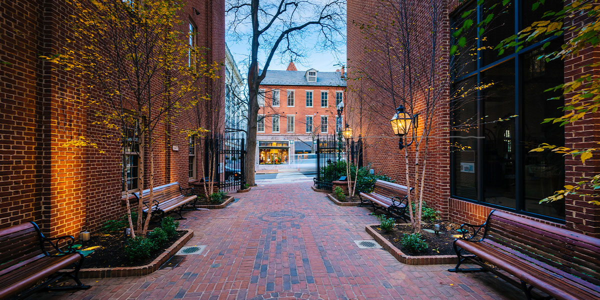 walking isle between building downtown lancaster