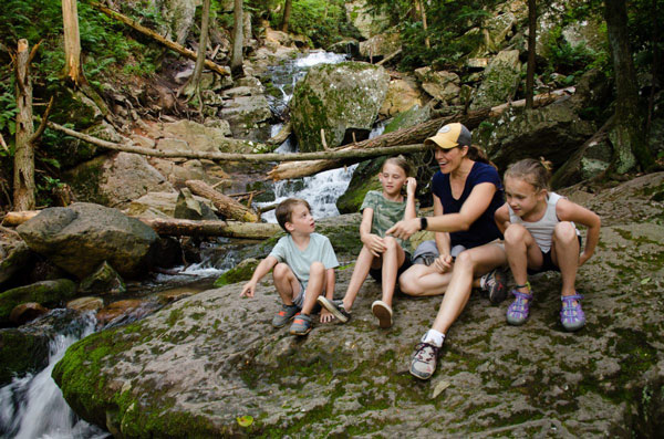 kids along with mother sitting next falls