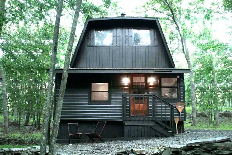 beautiful cabin house in the woods