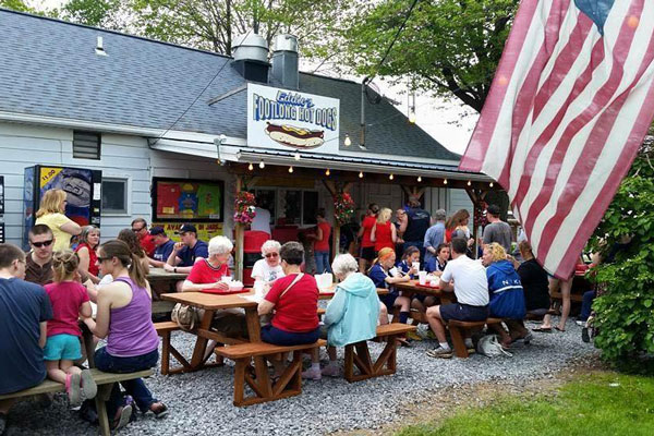 customers sitting and dining infront of store