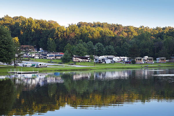 campers next to lake