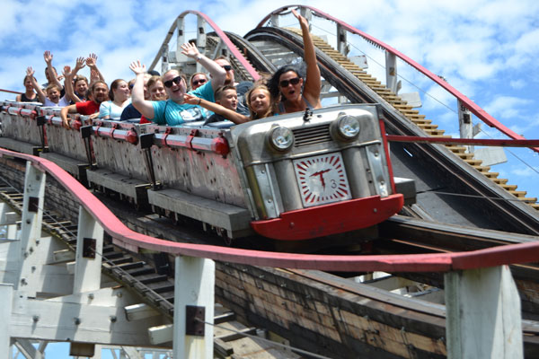 people enjoying roller coaster ride