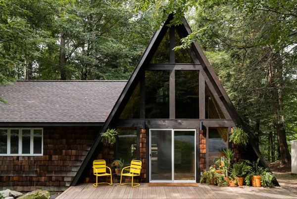 A house with a deck and chairs