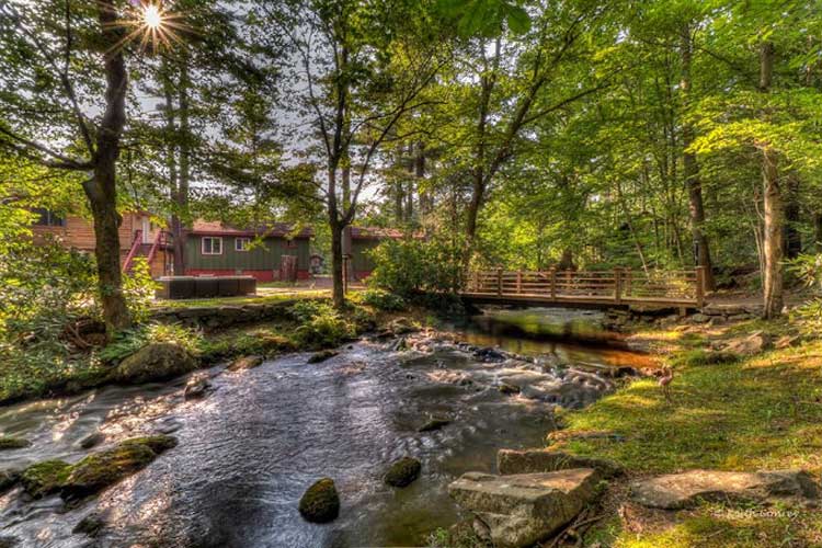 Cabin house by creek