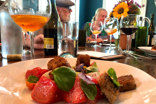 picture of salad plate couple in the background