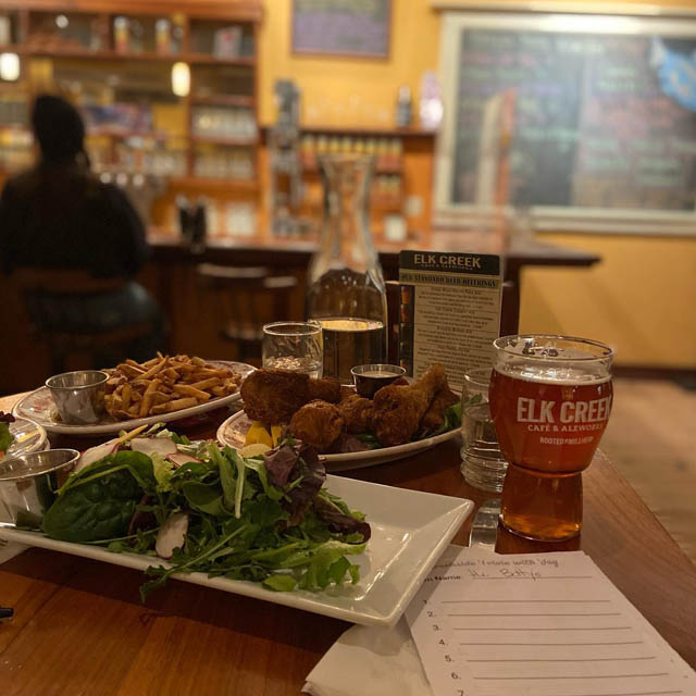 beer with wings fries and salad