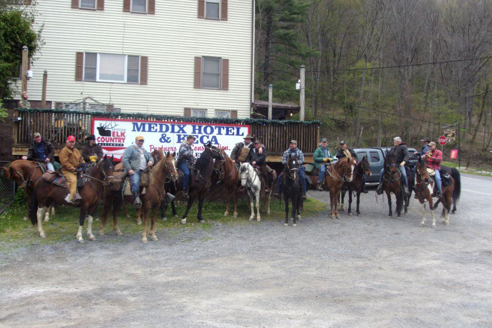 People doing horseback ride