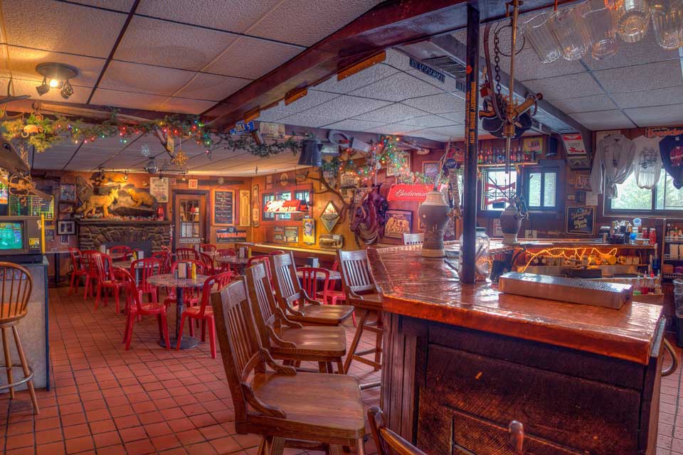 Tables and chairs inside the Diner