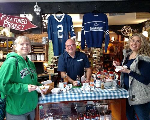 three people inside antique store