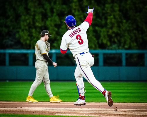 baseball player running base