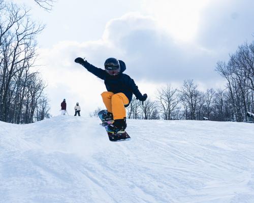 a person snowboarding stunts