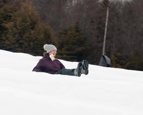 a person snowtubing